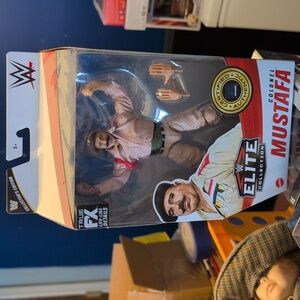 WWE Elite Colonel Mustafa Figure with Beige and Black